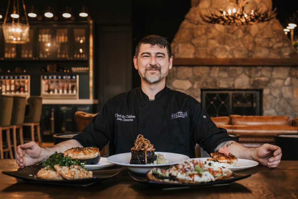 Urban Stillhouse Somerset dining room featuring Horse Soldier Bourbon décor